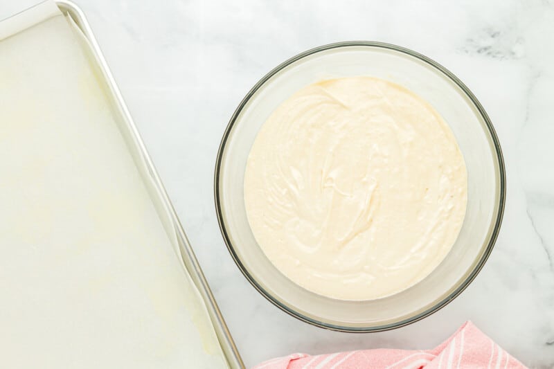 vanilla cake batter in a glass bowl.