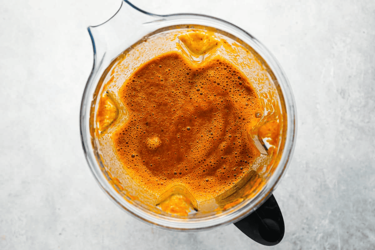 Pureed quesabirria sauce in the blender.