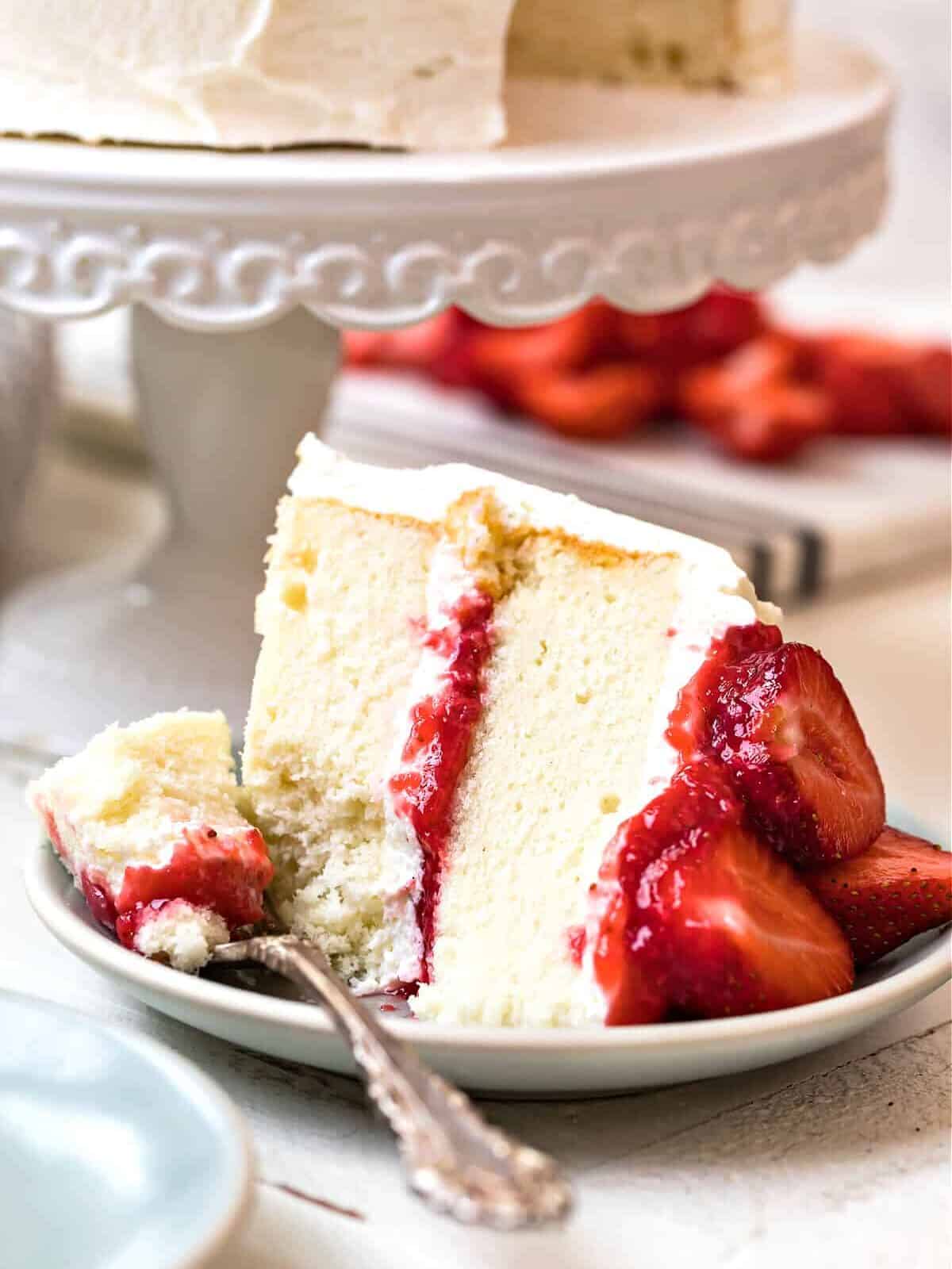 slice of white cake with strawberries