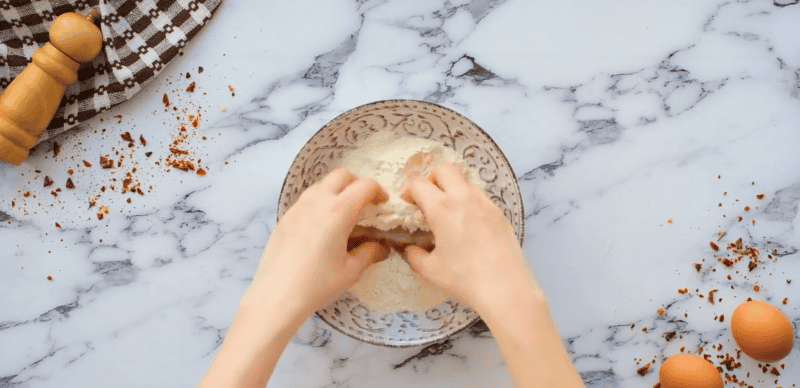 fish sticks dipped in flour mixture