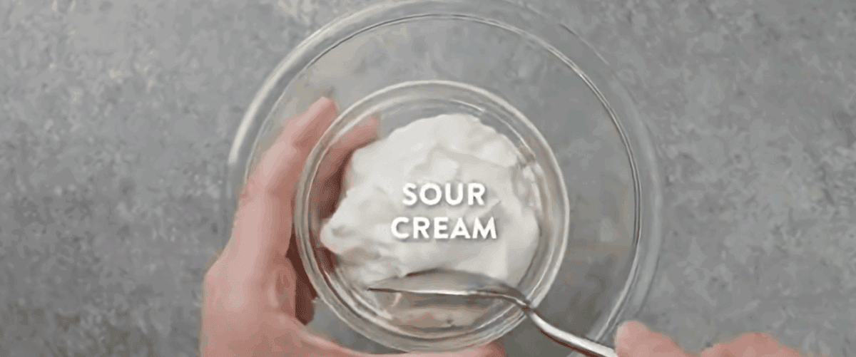 Making the dressing for the salad.