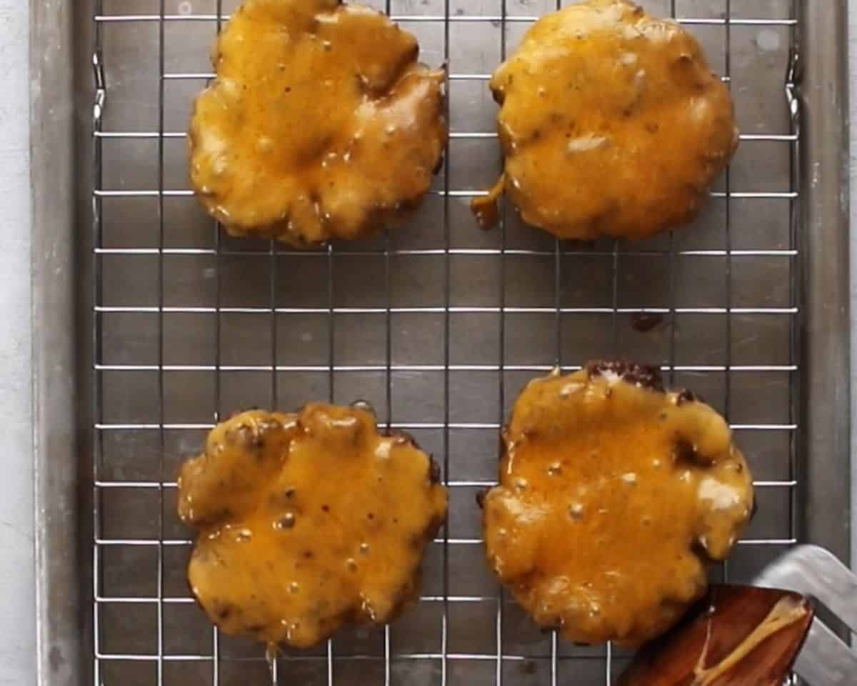 Burgers with cheese slices on them. - 11