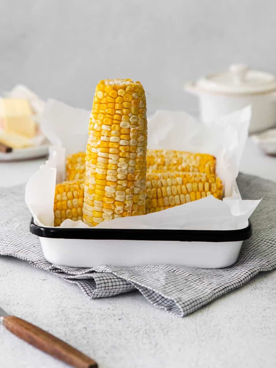 corn on the cob on a serving platter