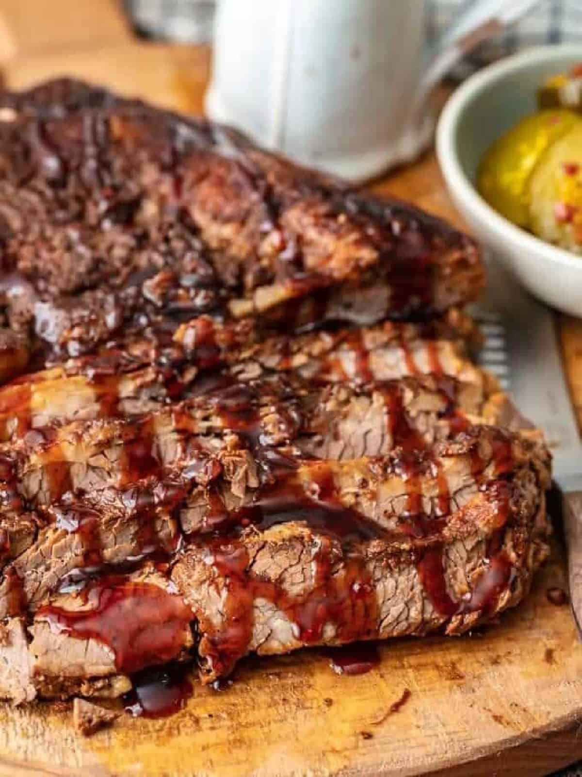 beef brisket drizzled with bbq sauce