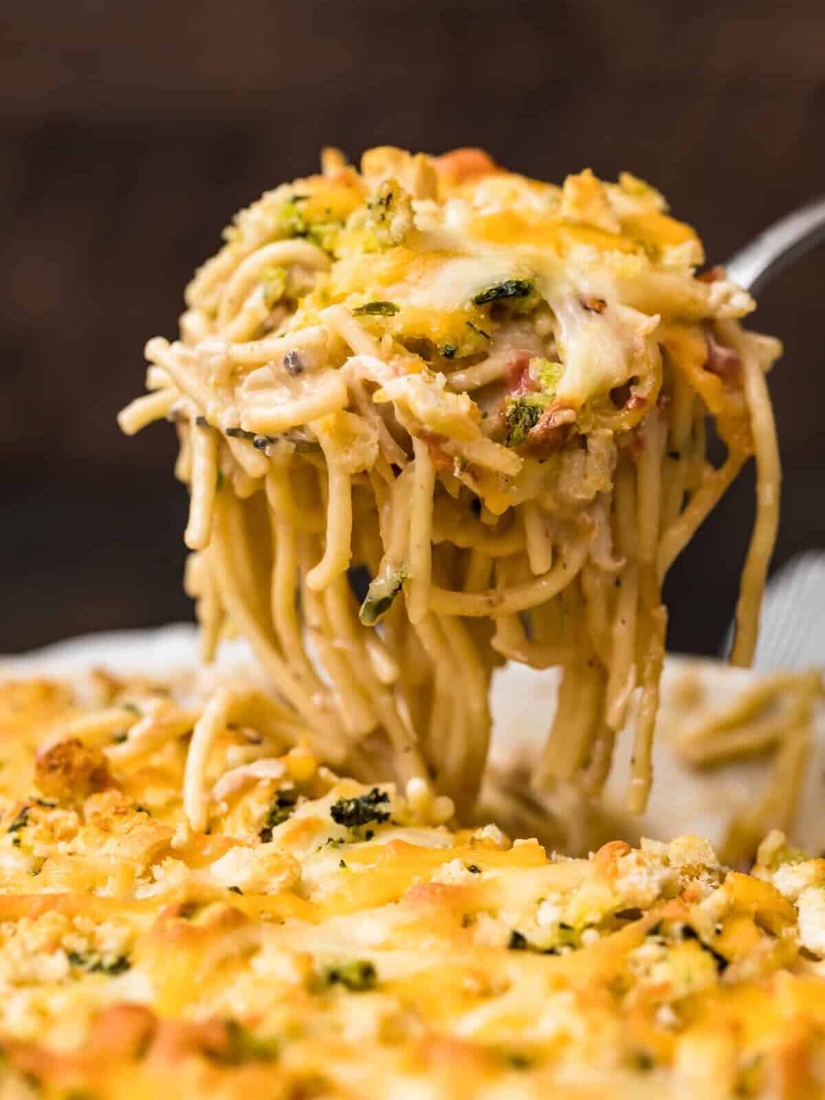 creamy chicken spaghetti on a serving spoon