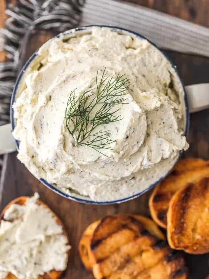 Boursin Cheese in a bowl with toasted bread.