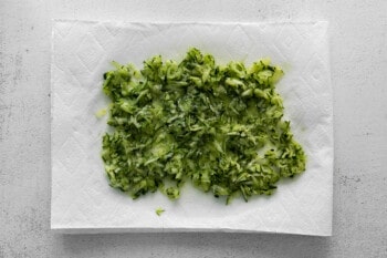 shredded cucumber on a paper towel.