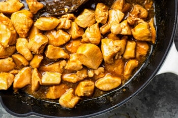 teriyaki chicken in a frying pan.
