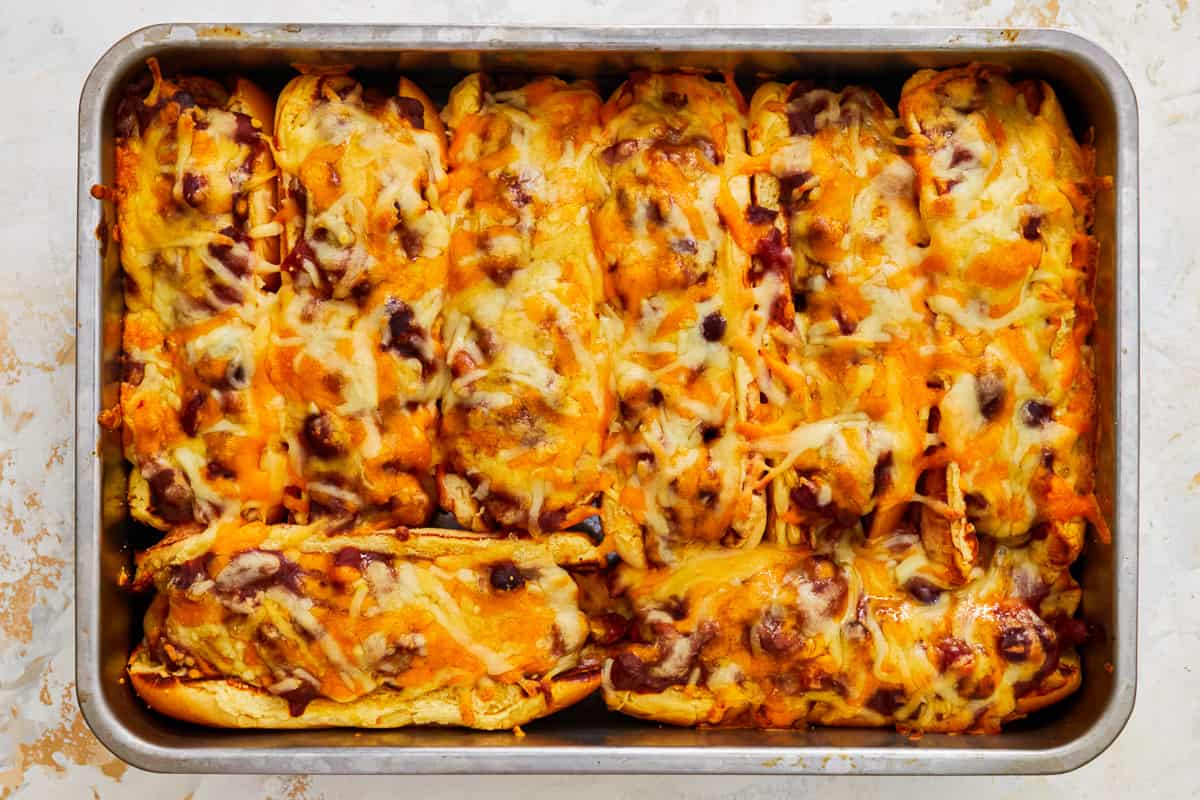 baked chili dogs in a baking pan.