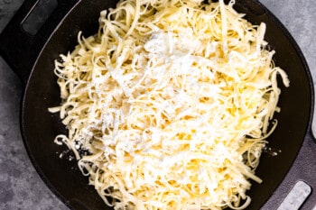 shredded cheese and cornstarch in a pot.