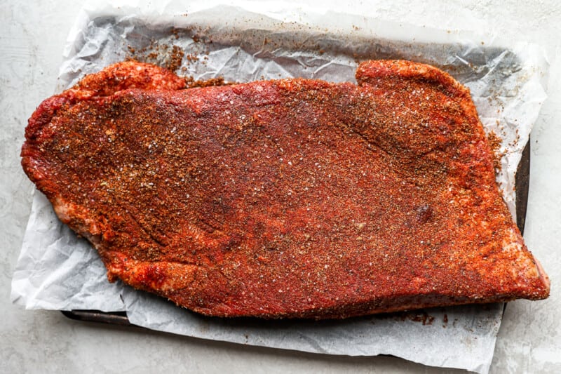 a piece of meat on a baking sheet.