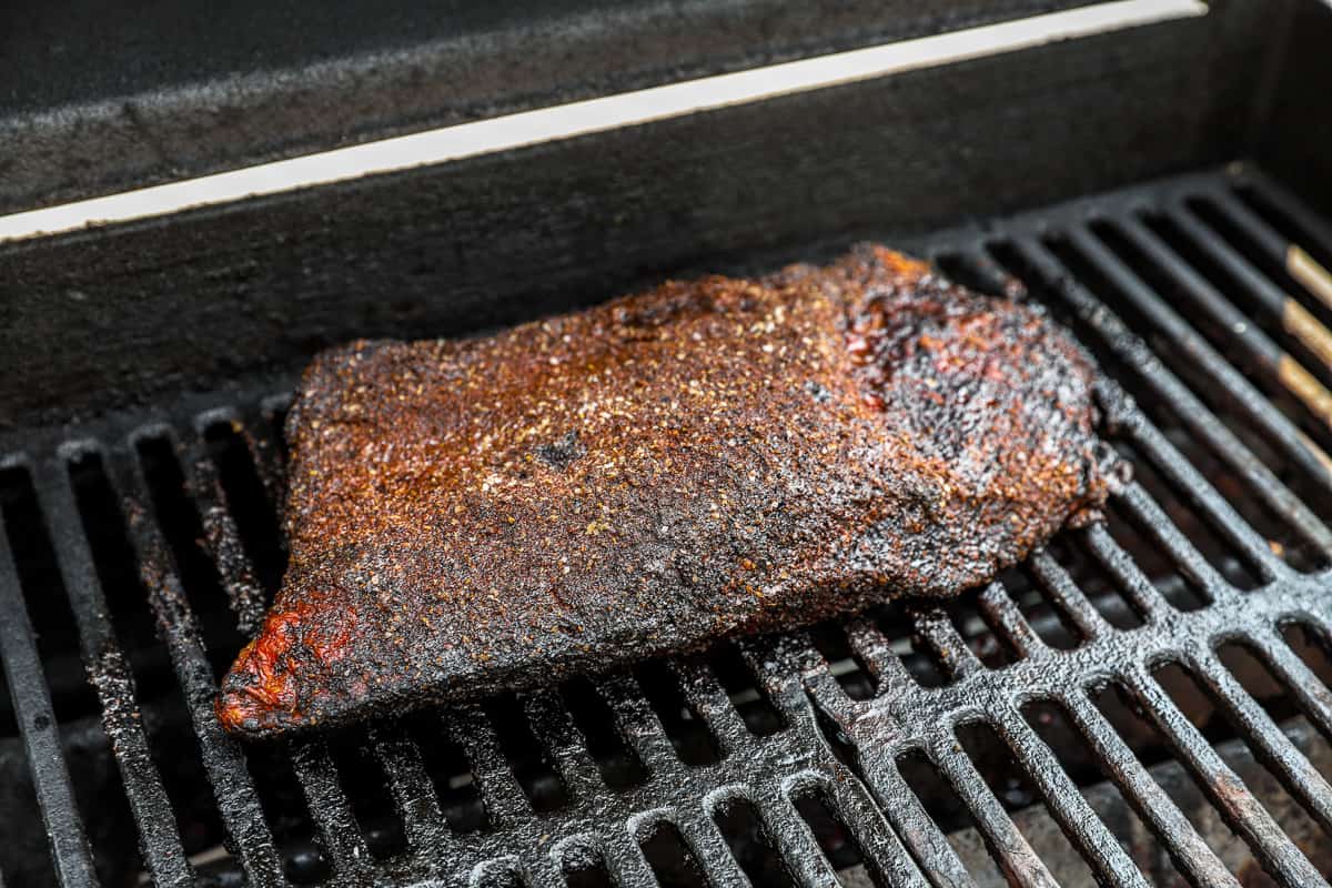 Cooked brisket on the grill.