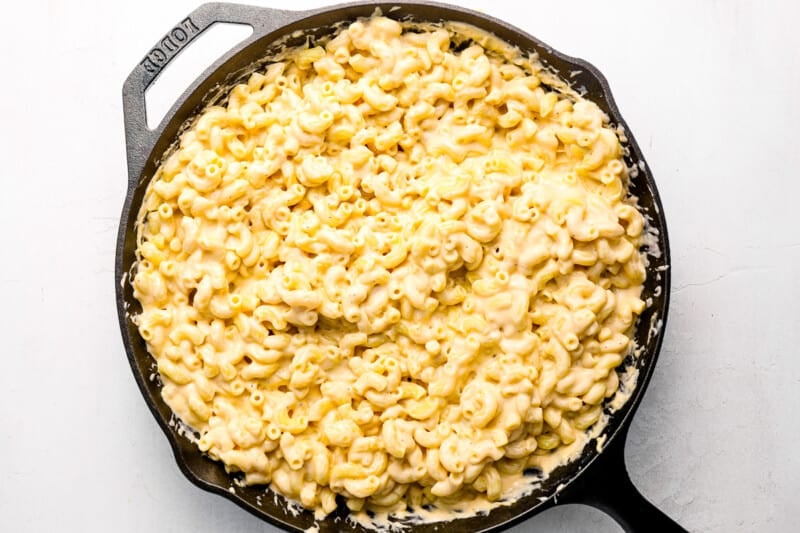 mac and cheese in a cast iron pan.