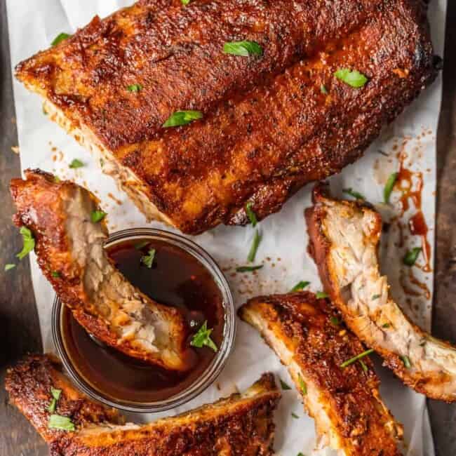 Kick your BBQ skills up a notch with OVEN BAKED RIBS! These dry rubbed ribs are one of our favorite easy dinner, SO MUCH FLAVOR!