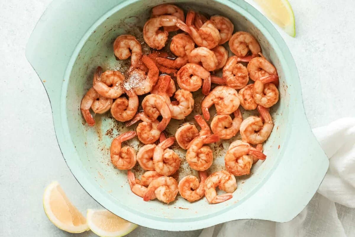 spicy mexican shrimp in a blue bowl.