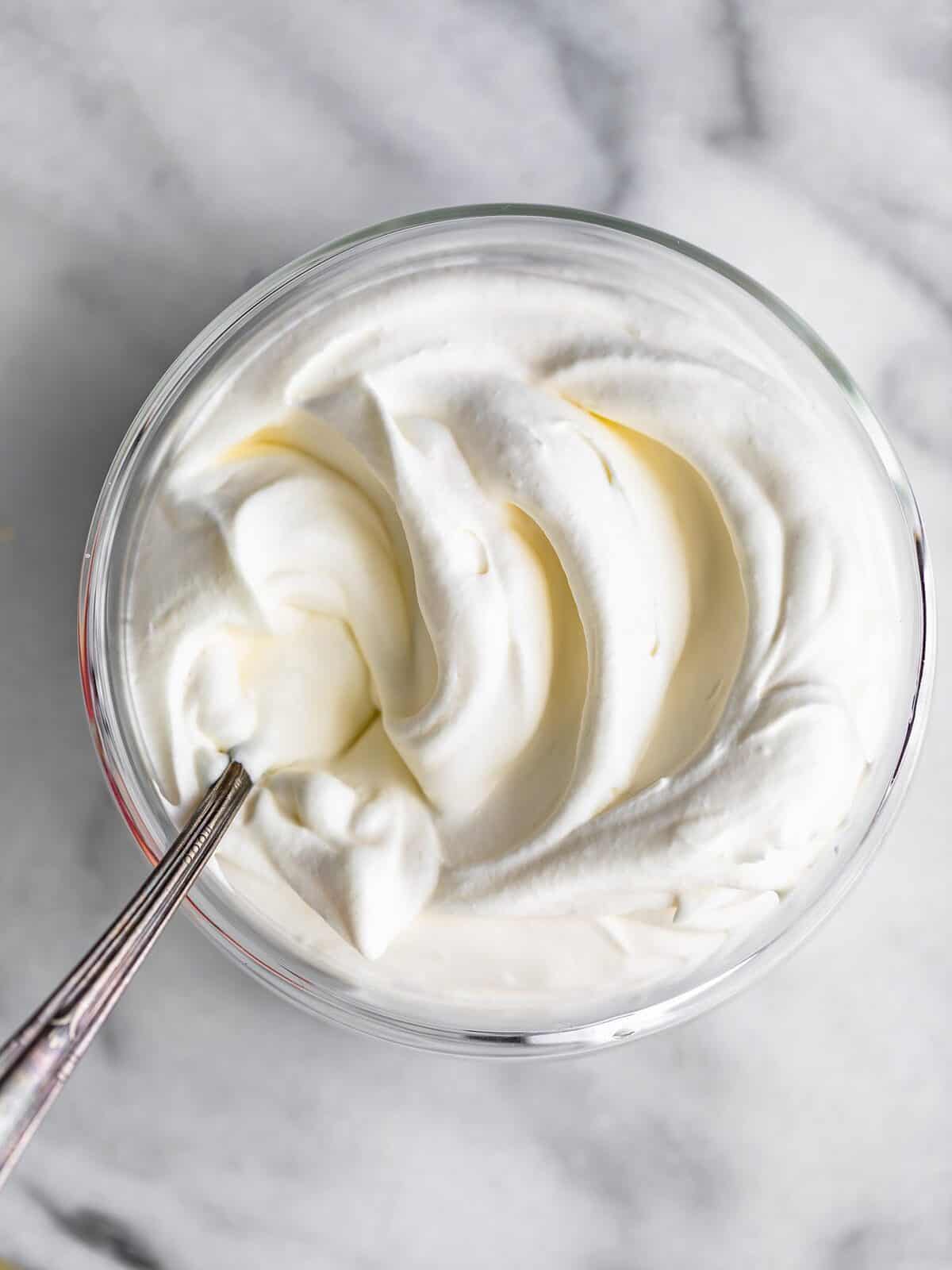 a bowl of stabilized whipped cream
