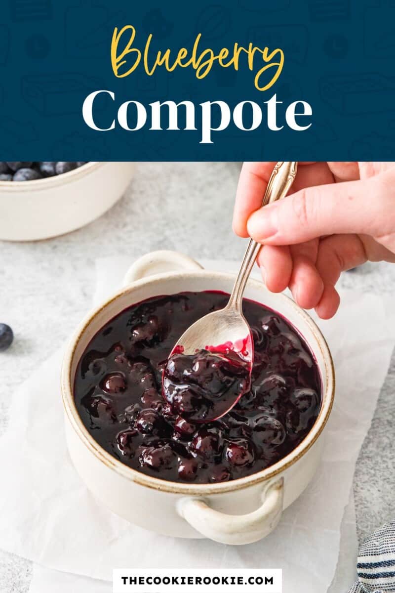 blueberry compotes with a spoon in a bowl.