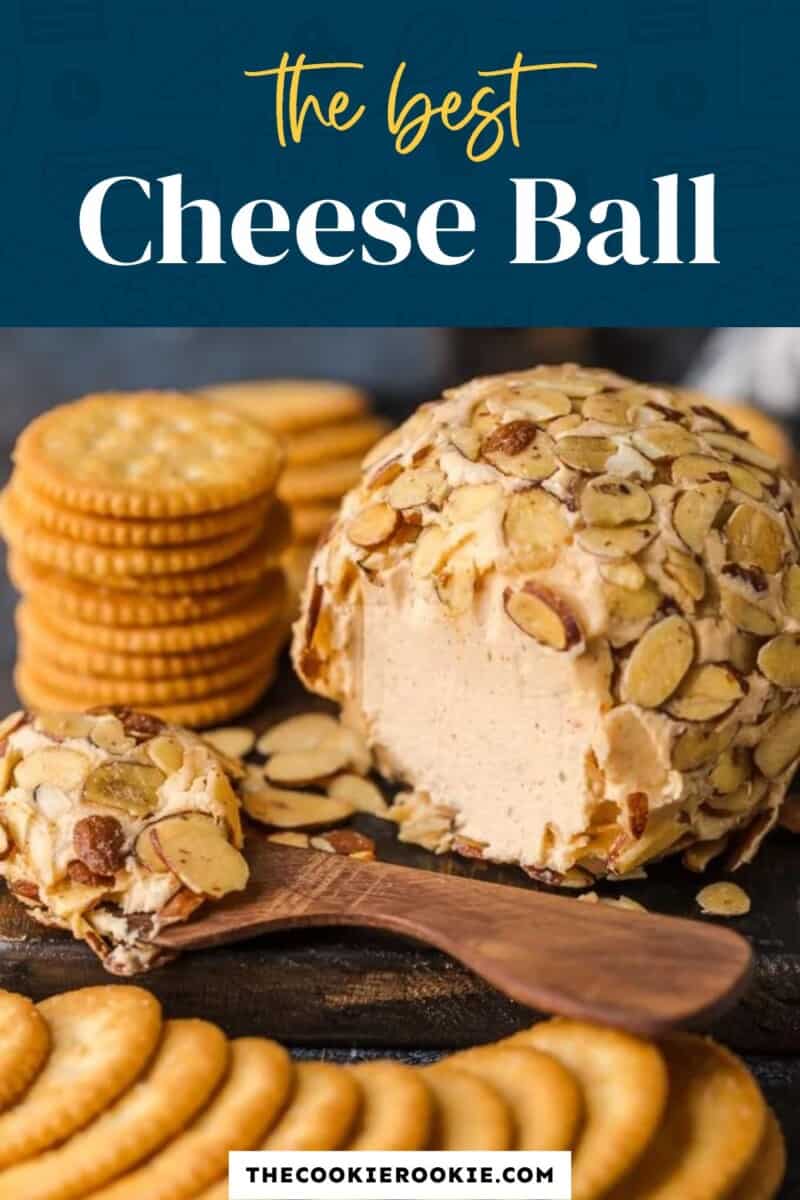the best cheese ball on a cutting board with crackers.