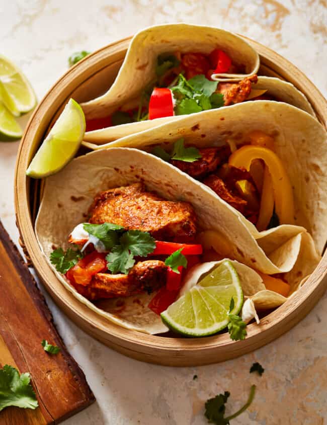 https://www.thecookierookie.com/wp-content/uploads/2023/07/baked-chicken-fajitas-recipe-650x845.jpg