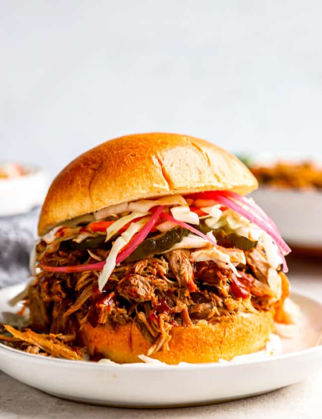 https://www.thecookierookie.com/wp-content/uploads/2023/07/crockpot-pulled-pork-recipe-4-650x845.jpg