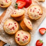 strawberry muffins on a cutting board.