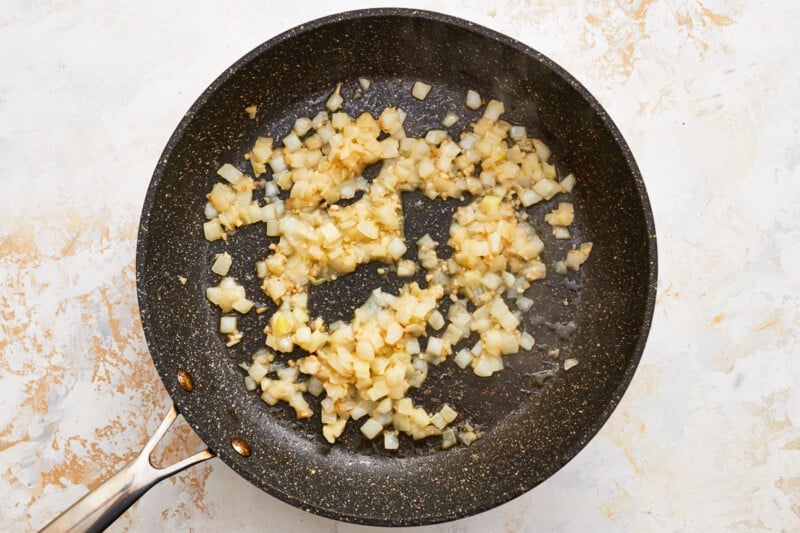 fried onions in a frying pan.