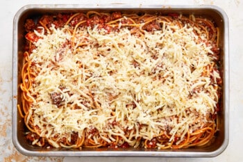 spaghetti and meatballs in a baking dish.
