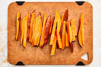 sweet potato fries on a cutting board.