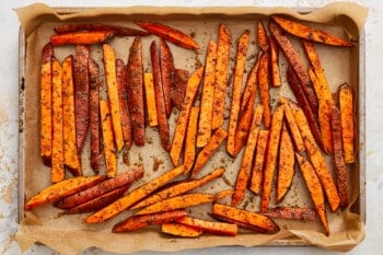 sweet potato fries on a baking sheet.