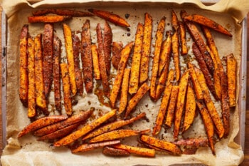 sweet potato fries on a baking sheet.