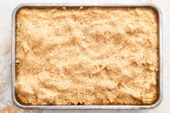 a baking dish filled with a crumb topping.