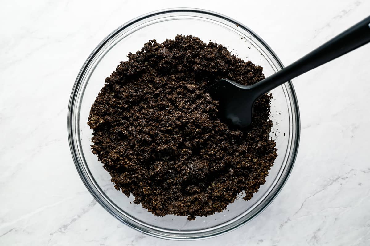 a bowl filled with a mixture of brown sugar and cocoa powder.