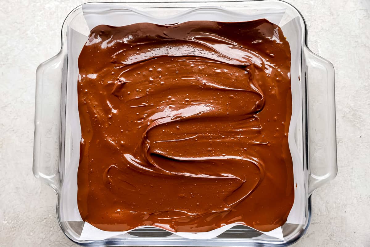 chocolate fudge in a glass baking dish.