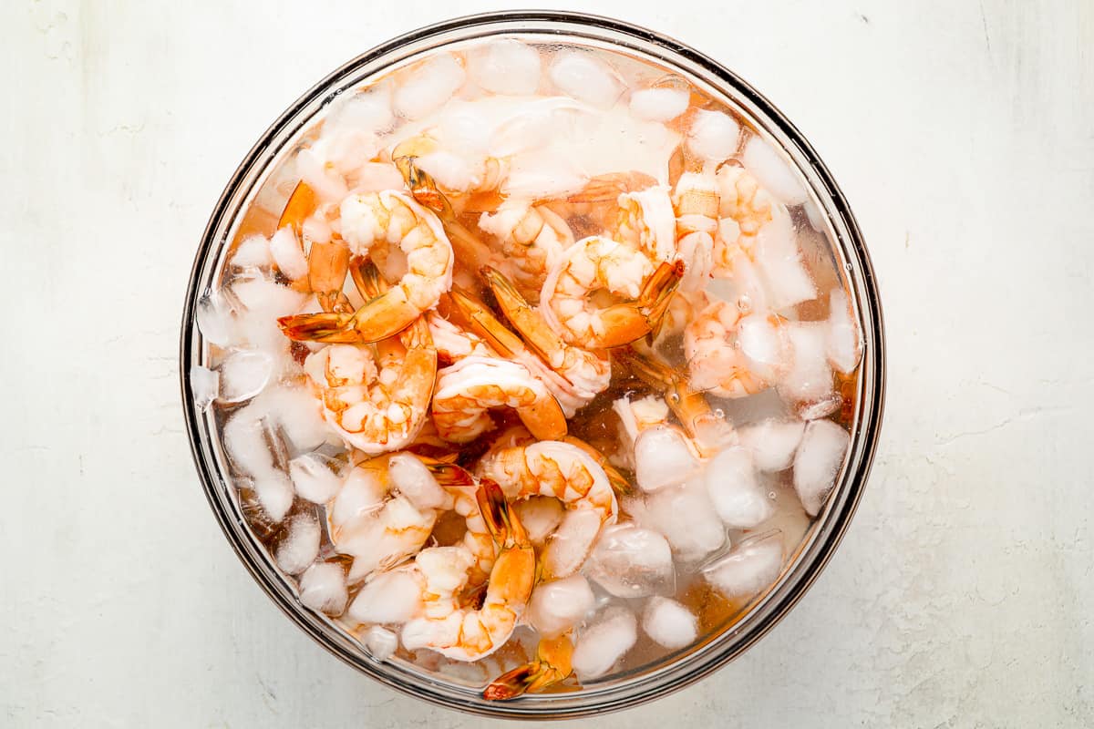 shrimp on ice in a bowl.