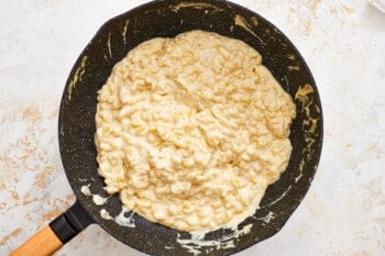 macaroni and cheese in a frying pan.