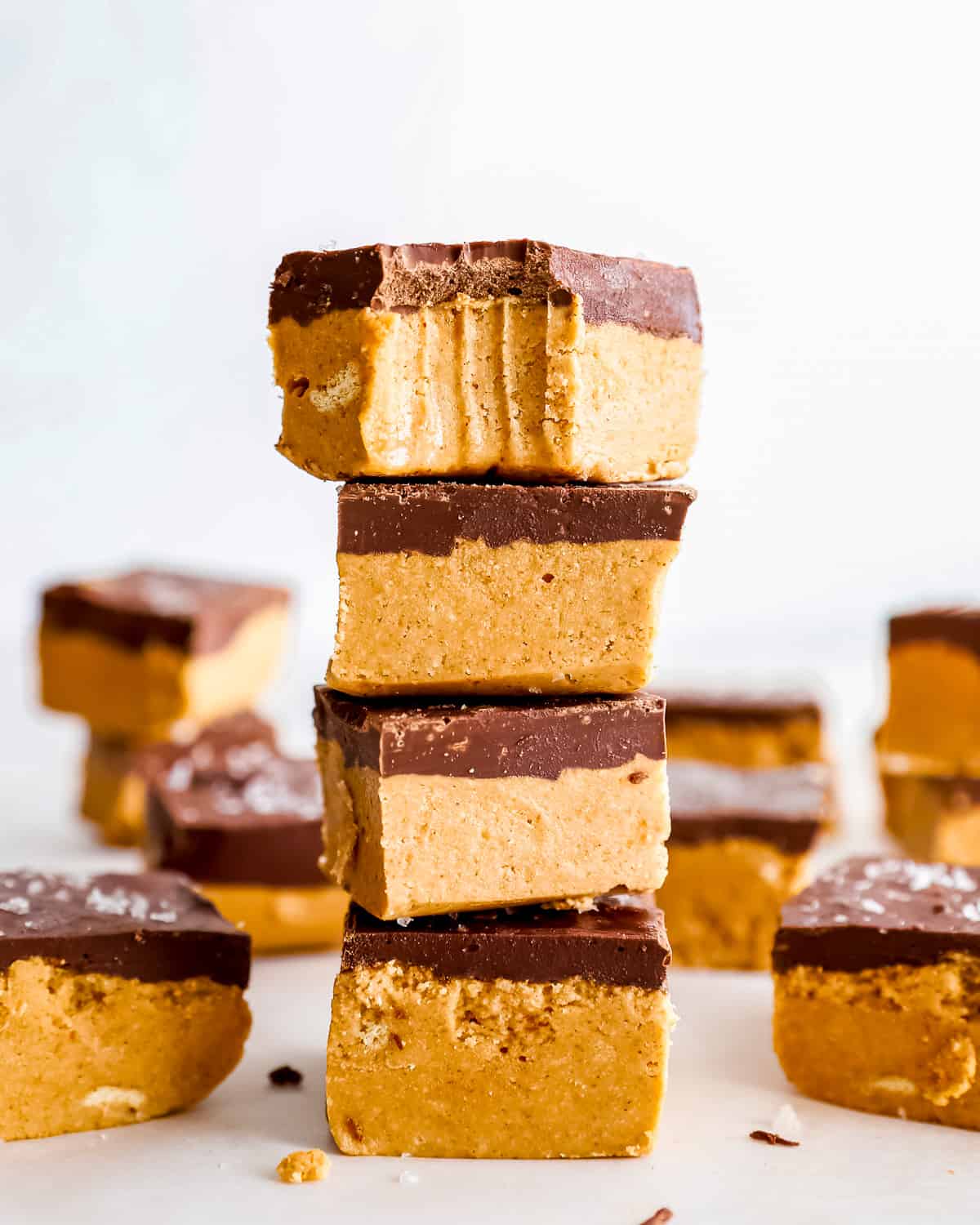 peanut butter bars stacked on top of each other.