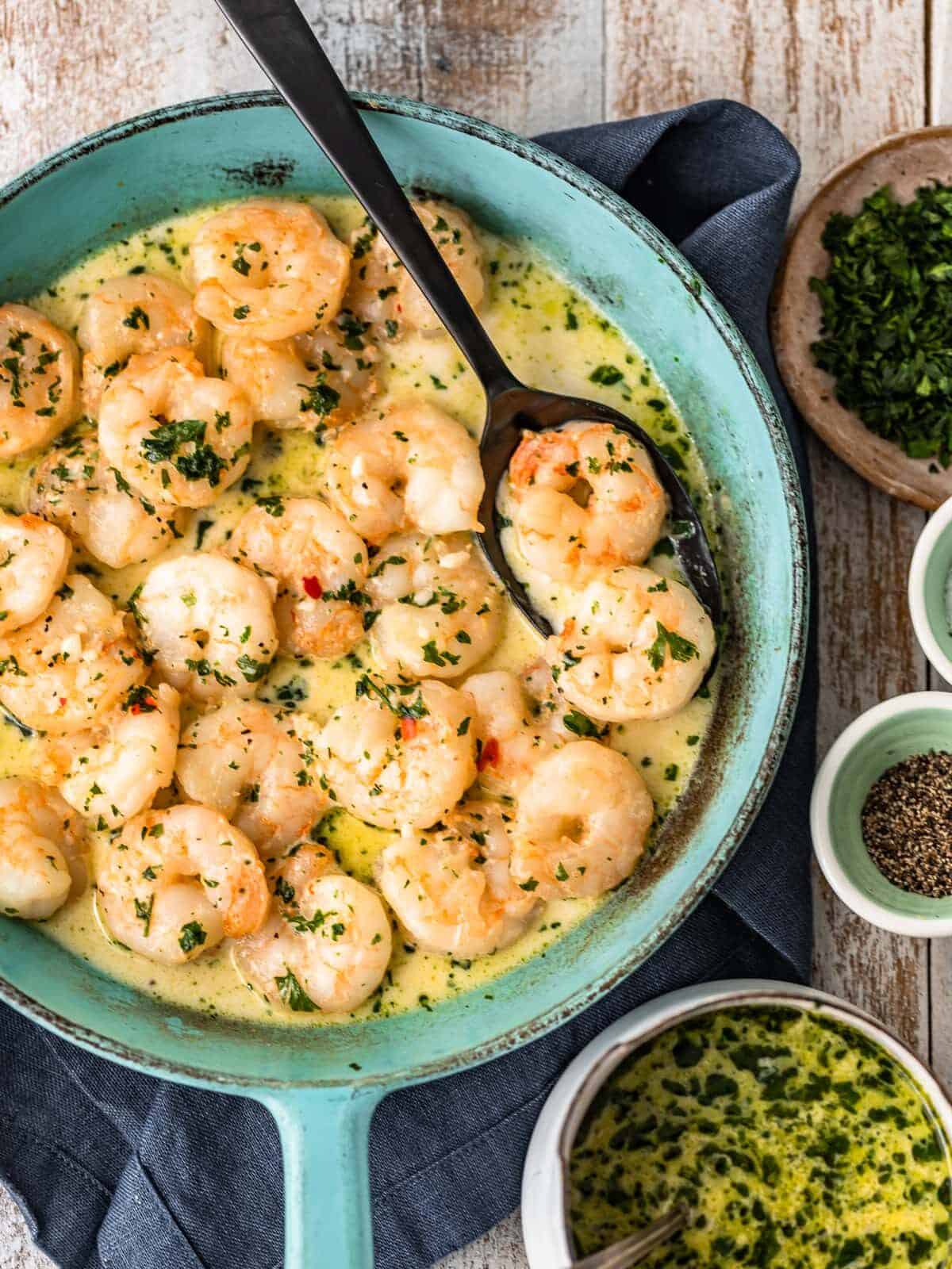 Garlic Shrimp is a simple, easy recipe to make for appetizers or for dinner. This spicy garlic shrimp recipe is just SO tasty, and only takes about 10 minutes to makes. Serve this sauteed garlic shrimp as a quick app, or turn it into a creamy garlic shrimp pasta. Either way, everyone will love it!