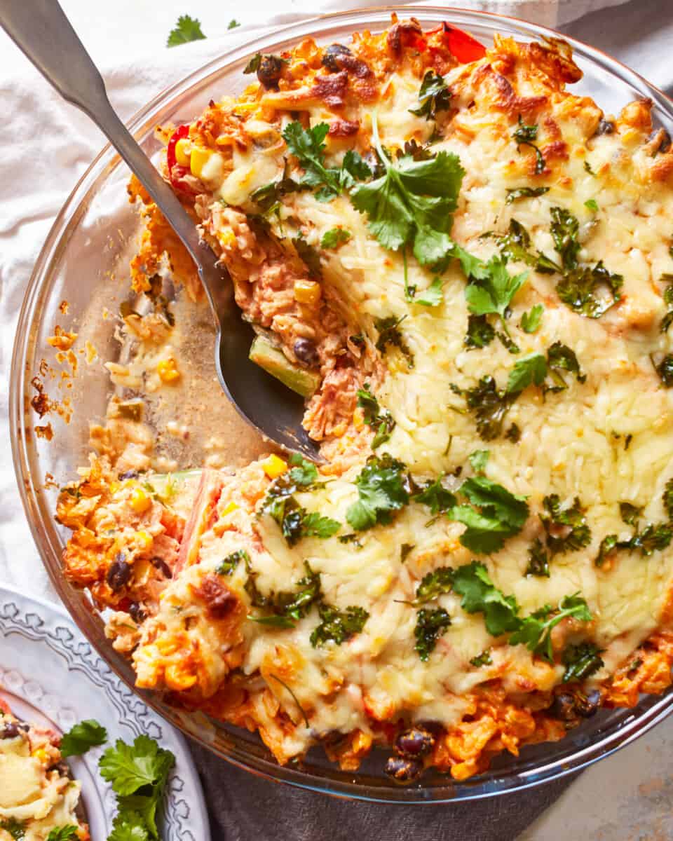 a casserole dish with a slice taken out of it.