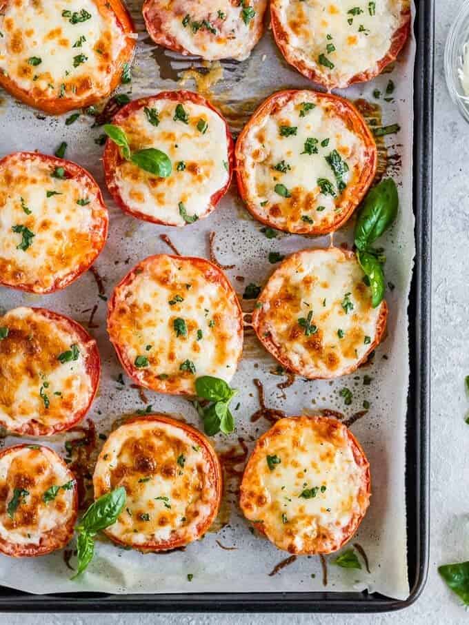 baked tomatoes with parmesan, mozzarella, and fresh basil