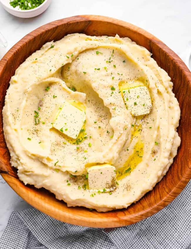 crockpot mashed potatoes with pats of butter