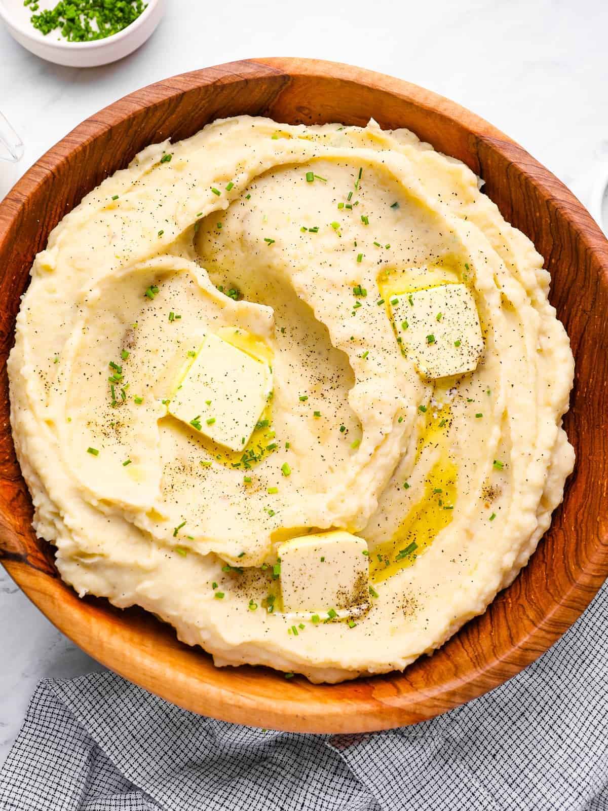 crockpot mashed potatoes with pats of butter