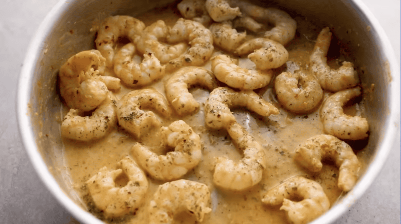 garlic butter shrimp in sauce.