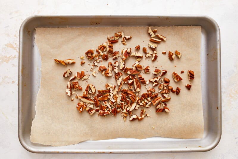 Pecans on a baking sheet.