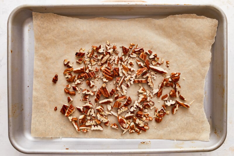 Pecans on a baking sheet.