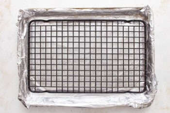 A baking sheet covered in aluminum foil.