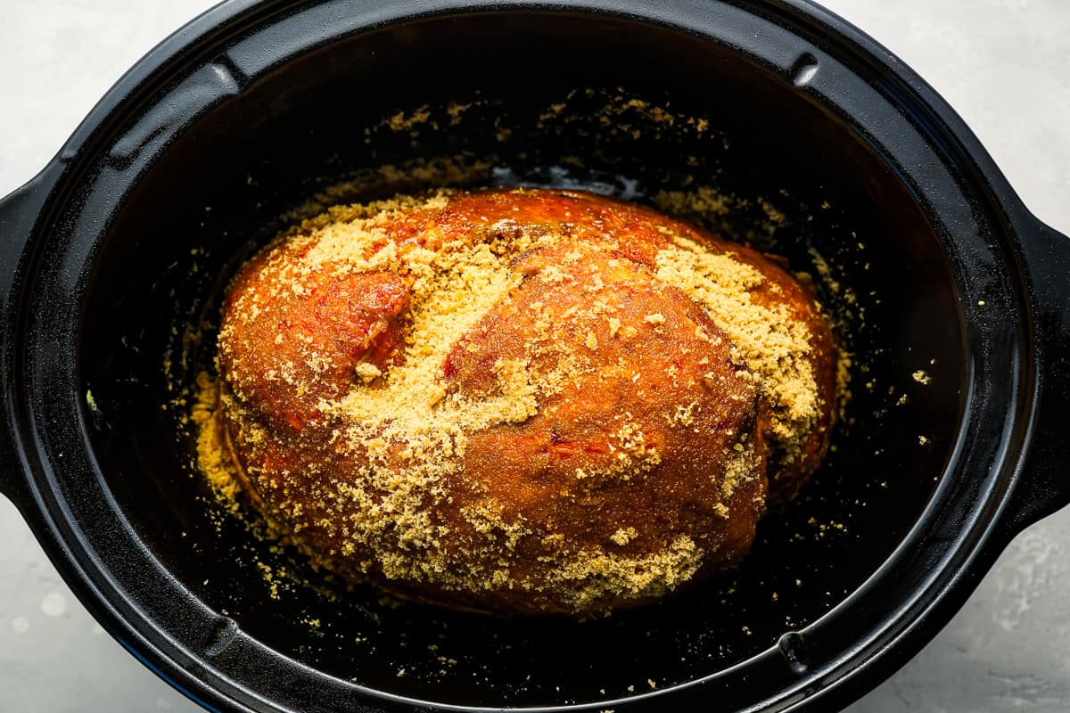 Seasoned ham in a crockpot. 