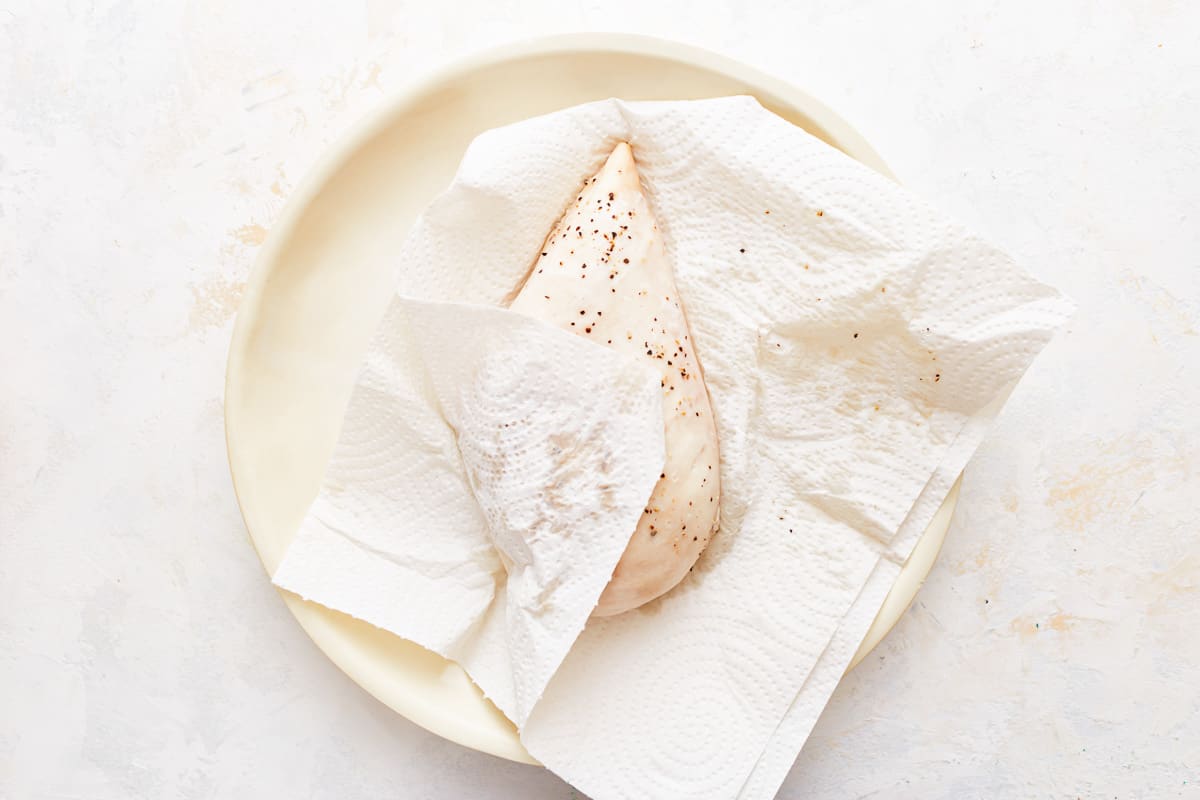 Chicken breast on a paper towel. 