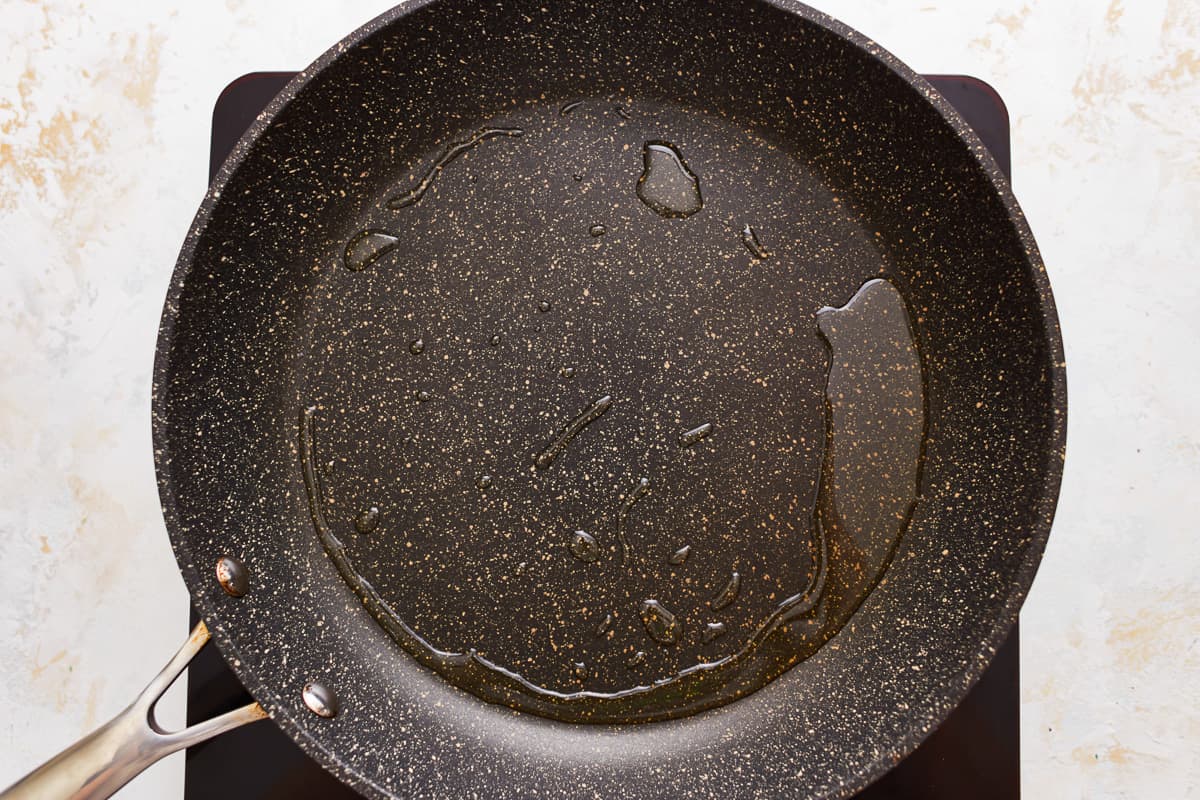 Melting butter in a skillet.