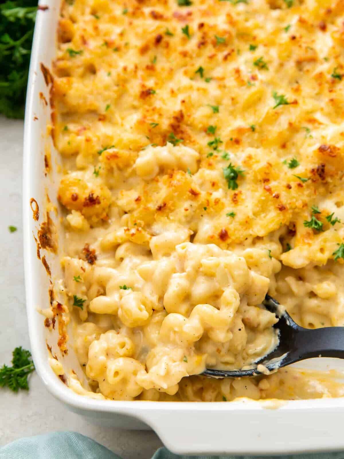 casserole dish with creamy lobster mac and cheese