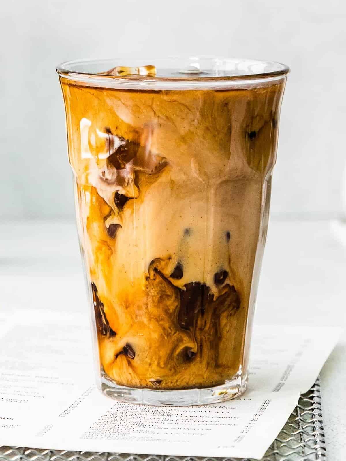 up close pumpkin cream cold brew in glass cup